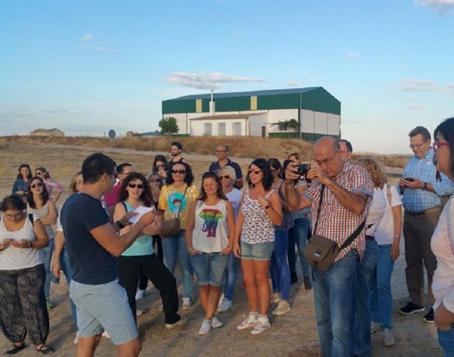 The group listening to the guide 